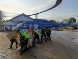 Menembus Langit Pijay: Personel Kodim 0102/Pidie Terima Droping Bantuan Pangdam IM untuk Korban Banjir