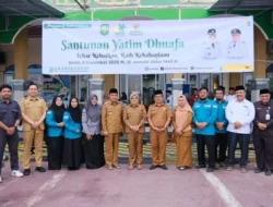 Bupati Siak Afni Z BAZNAS santunan anak yatim seragam sekolah gratis sekabupaten Siak