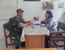 Babinsa Koramil Cepogo Dukung Gerakan GEMAR, Ayah Turun Langsung Ambil Rapor Anak
